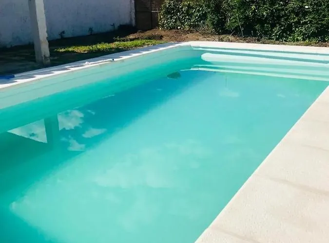 Casa en Villa Carlos Paz con Pileta Exclusiva , Quincho con Asador y Jardín a Pasos del Centro