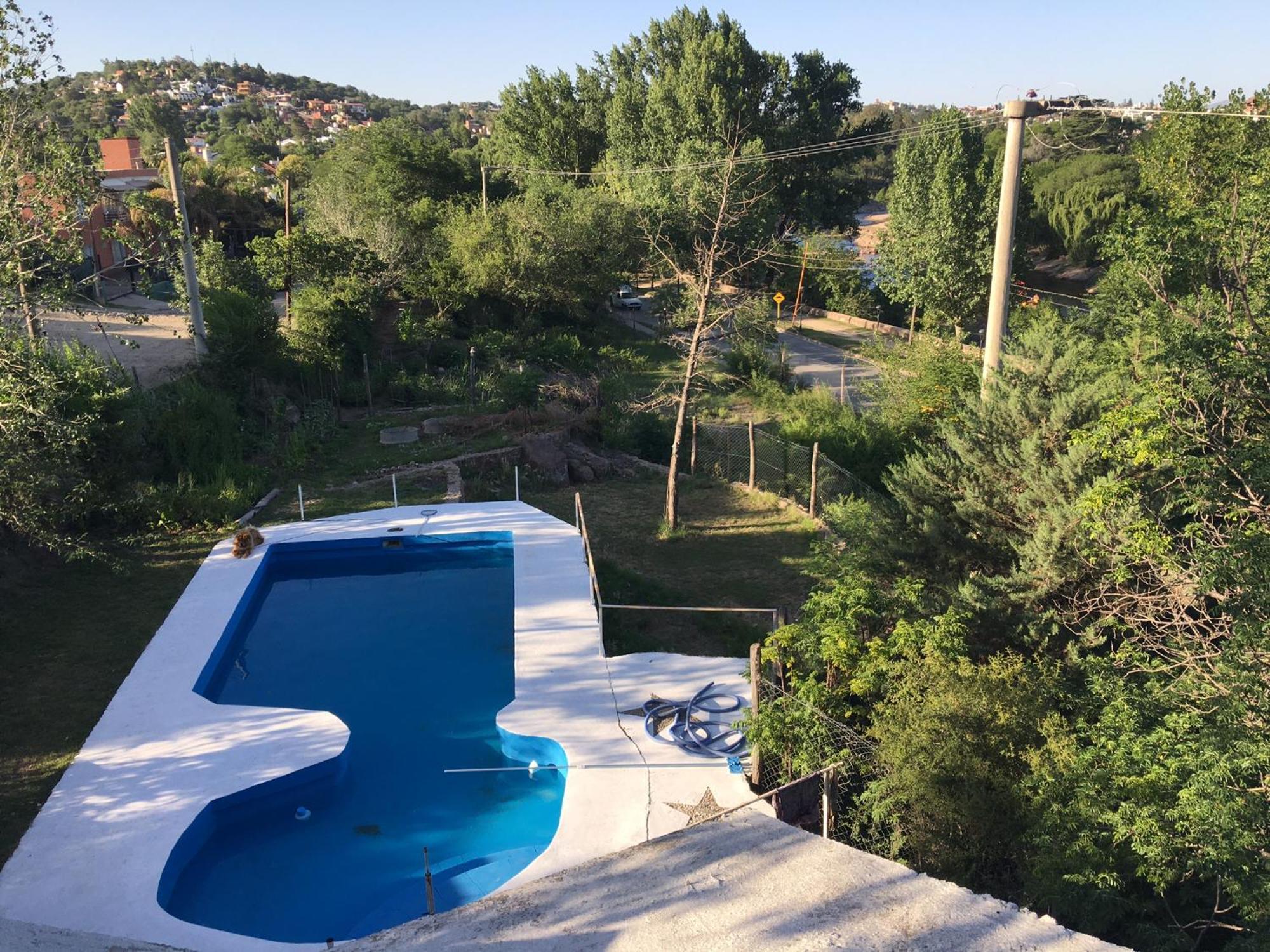Сasa de vacaciones Casa Carlos Paz, Con Pileta, Frente Al Rio Villa Carlos Paz